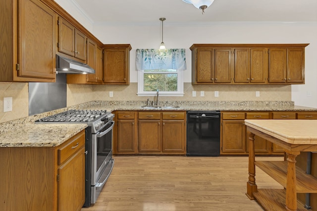 kitchen with sink, hanging light fixtures, black dishwasher, stainless steel range with gas cooktop, and light wood-type flooring