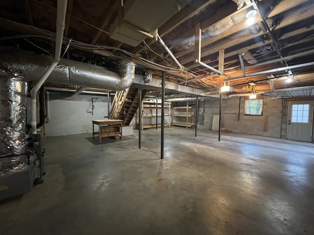 basement featuring heating unit