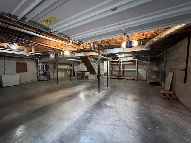 basement featuring heating unit