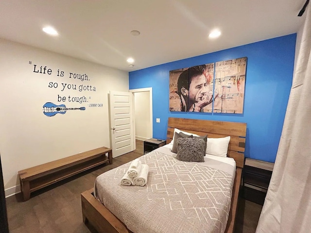 bedroom featuring dark hardwood / wood-style floors