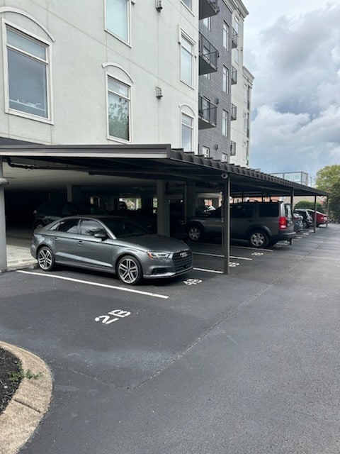 view of car parking featuring a carport