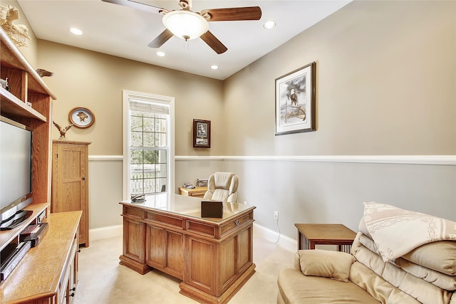 carpeted office with ceiling fan