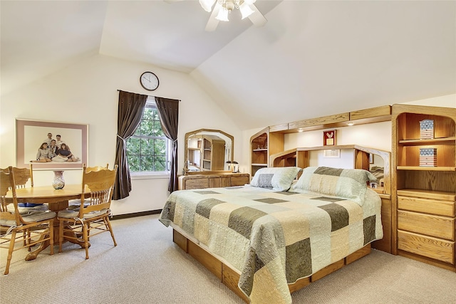 bedroom with carpet, lofted ceiling, and ceiling fan