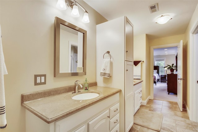 bathroom featuring vanity and tile patterned floors