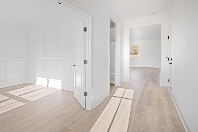 hall featuring light hardwood / wood-style flooring