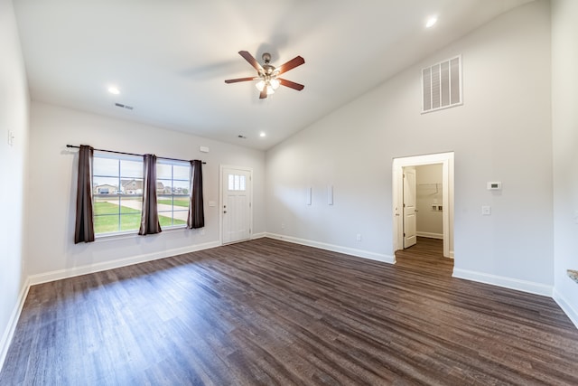 spare room featuring ceiling fan, high vaulted ceiling, and dark hardwood / wood-style flooring