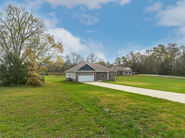 ranch-style house featuring a garage and a front lawn