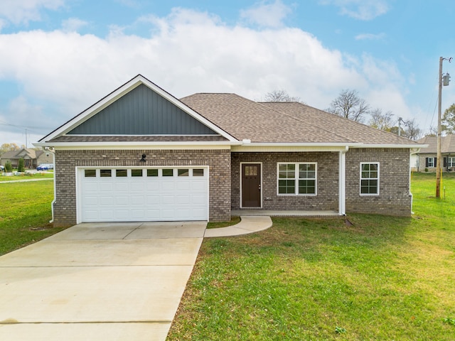 view of front facade with a front lawn and a garage