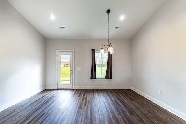 empty room featuring dark hardwood / wood-style floors