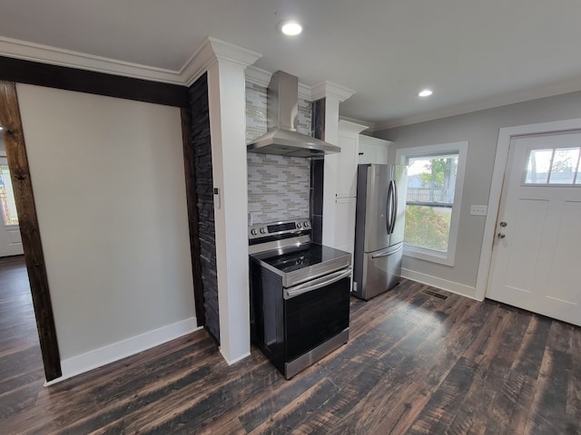 kitchen with stainless steel appliances, tasteful backsplash, wall chimney exhaust hood, dark hardwood / wood-style floors, and white cabinets