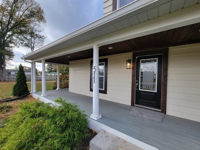 doorway to property with covered porch