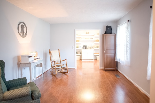 living area with light wood-type flooring