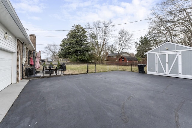 view of patio with a storage unit