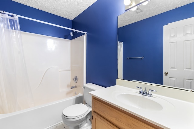 full bathroom with shower / bath combination with curtain, vanity, a textured ceiling, and toilet