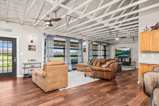 living room featuring high vaulted ceiling, beamed ceiling, ceiling fan, and dark hardwood / wood-style floors