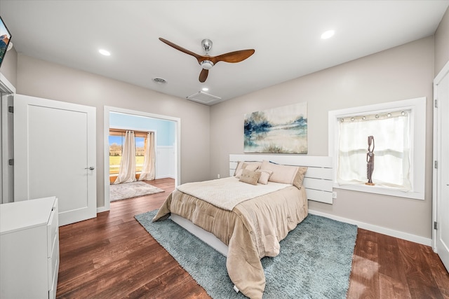 bedroom featuring dark hardwood / wood-style flooring and ceiling fan