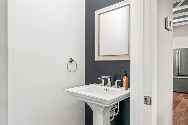 bathroom featuring hardwood / wood-style flooring