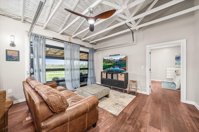 living room featuring beamed ceiling, ceiling fan, high vaulted ceiling, and wood-type flooring