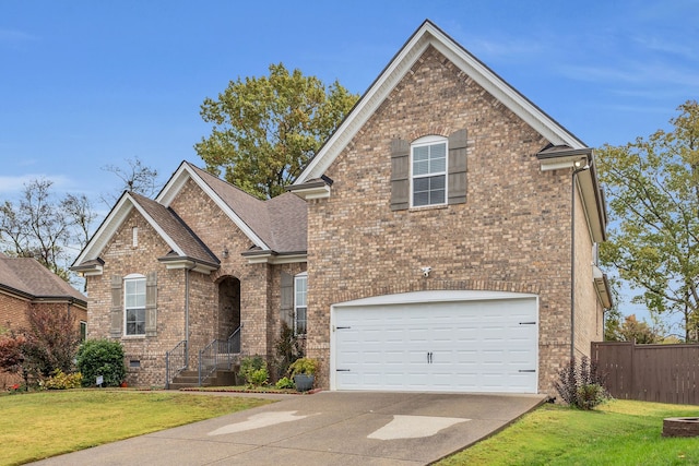 view of front of house featuring a front lawn and a garage