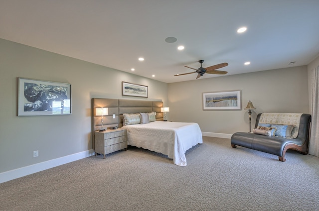 bedroom with ceiling fan and carpet floors