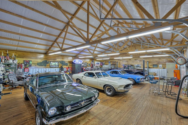 garage featuring wooden walls