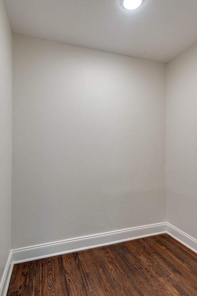 spare room featuring hardwood / wood-style flooring