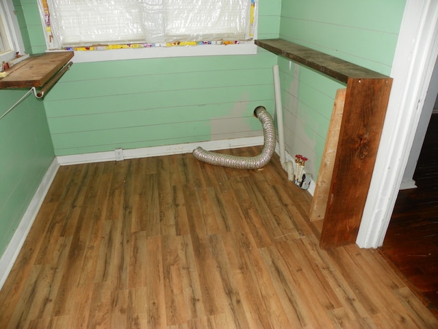 bathroom with hardwood / wood-style flooring