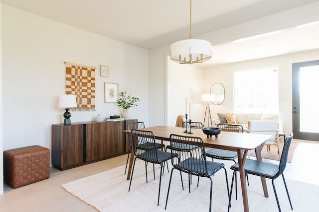 dining room with a chandelier