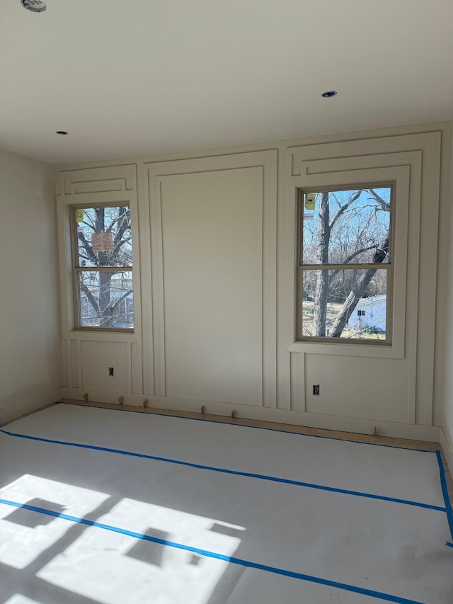 unfurnished room with a wealth of natural light