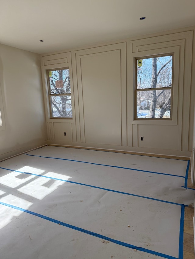 spare room with a wealth of natural light