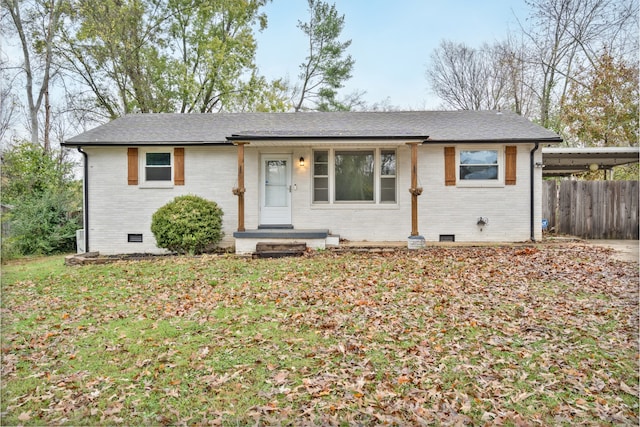 single story home with a front lawn