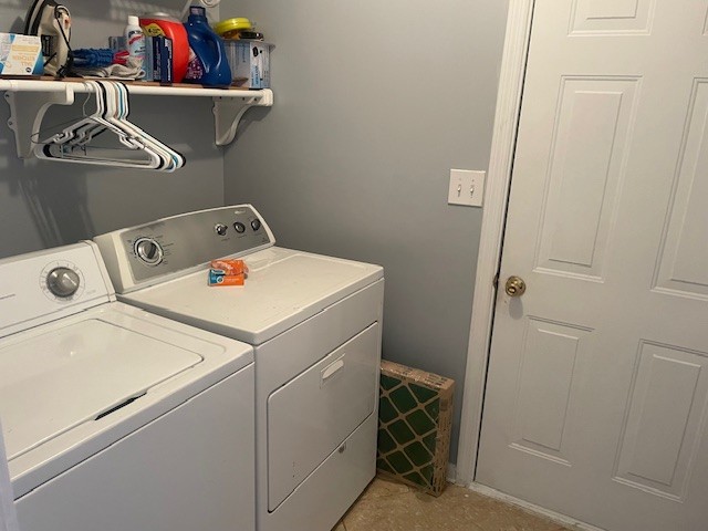 laundry area with washer and clothes dryer