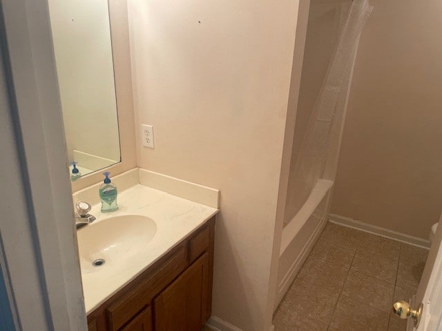 bathroom with vanity and tile patterned floors