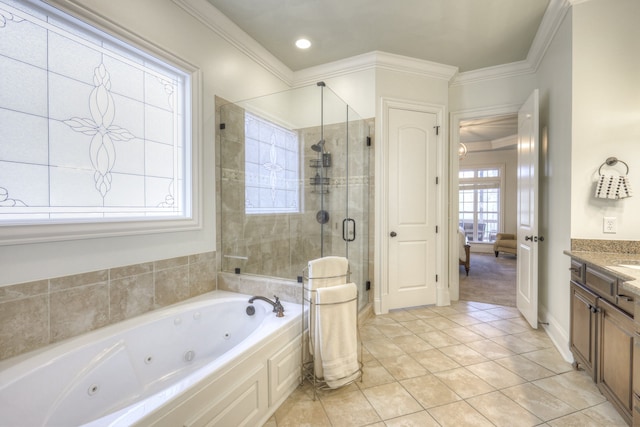 bathroom with ornamental molding, vanity, plus walk in shower, and tile patterned floors