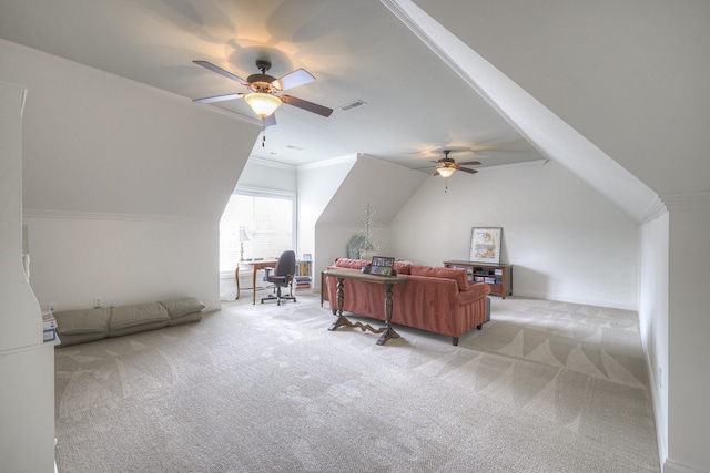 interior space featuring lofted ceiling, crown molding, and ceiling fan