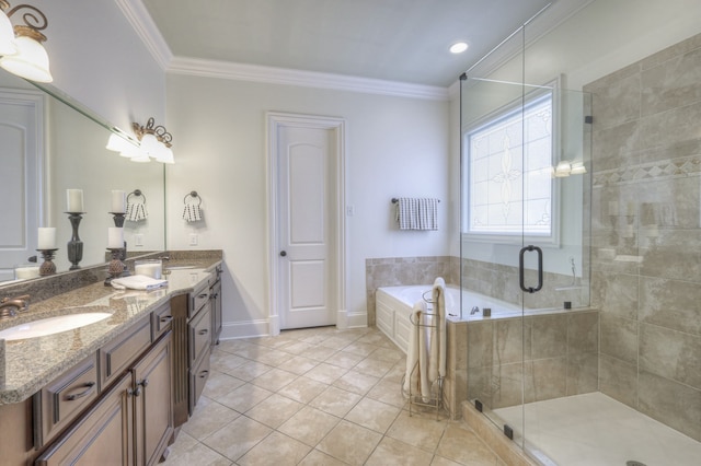 bathroom with tile patterned floors, ornamental molding, plus walk in shower, and vanity