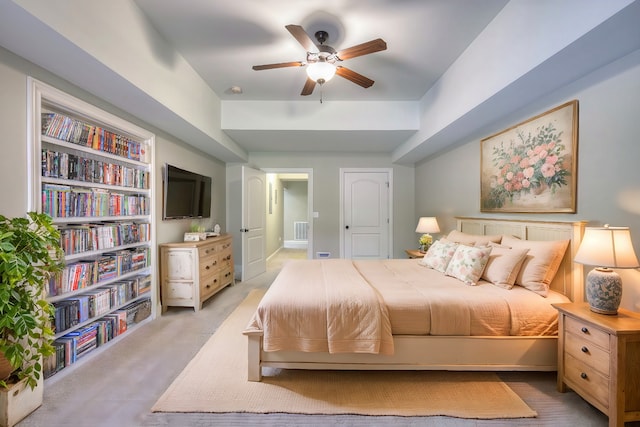 carpeted bedroom with ceiling fan