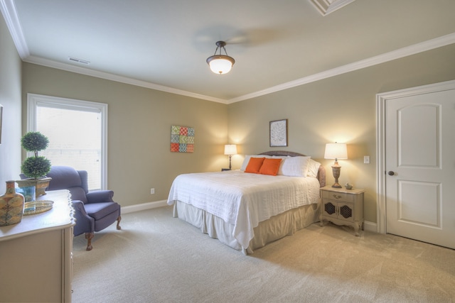 carpeted bedroom with ornamental molding