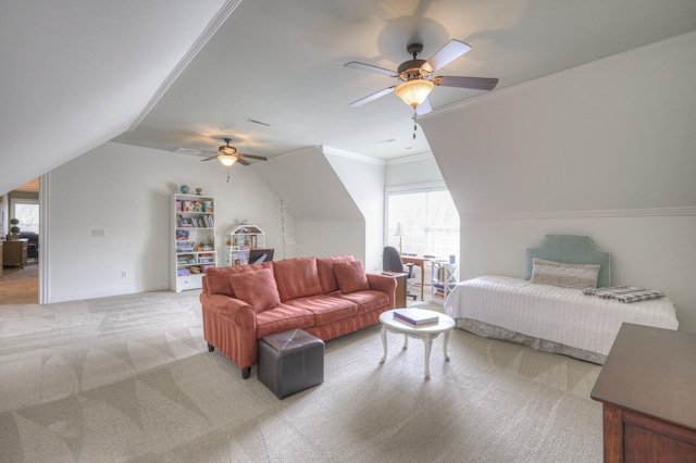 bedroom with crown molding, ceiling fan, lofted ceiling, and light carpet