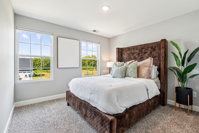 bedroom featuring carpet