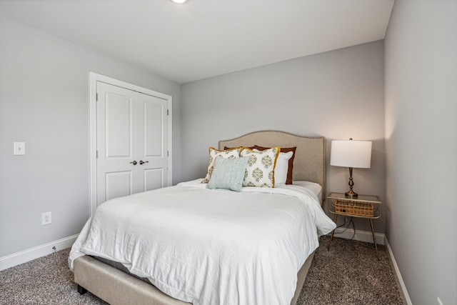 carpeted bedroom with a closet