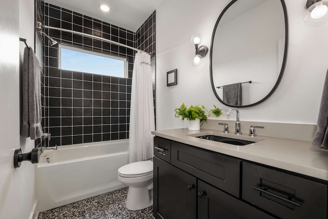 full bathroom with vanity, toilet, and shower / bath combo with shower curtain