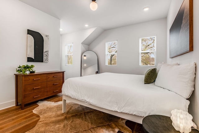 bedroom with wood-type flooring