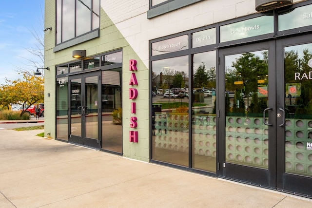 entrance to property featuring french doors