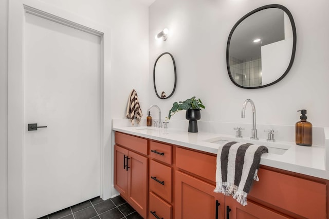 bathroom with vanity and tile patterned floors