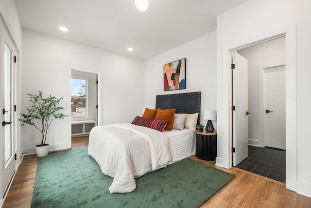 bedroom featuring dark wood-type flooring