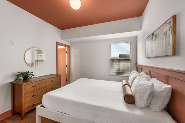 bedroom featuring hardwood / wood-style flooring