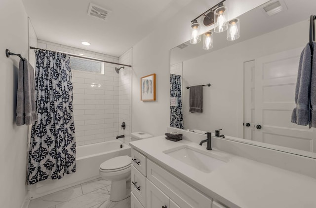 full bathroom featuring shower / bath combo, vanity, and toilet