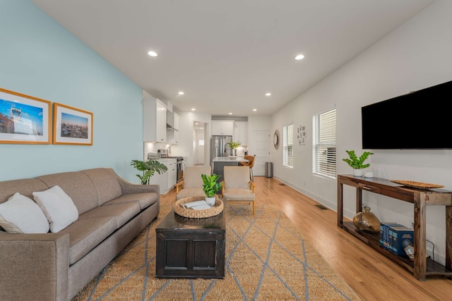 living room featuring light hardwood / wood-style floors