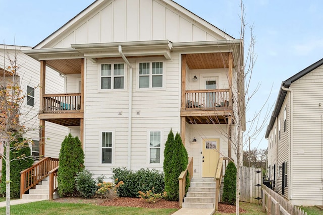 view of front of house featuring a balcony